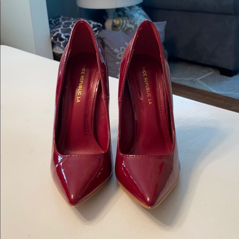 Deep red patent leather pumps, size 7